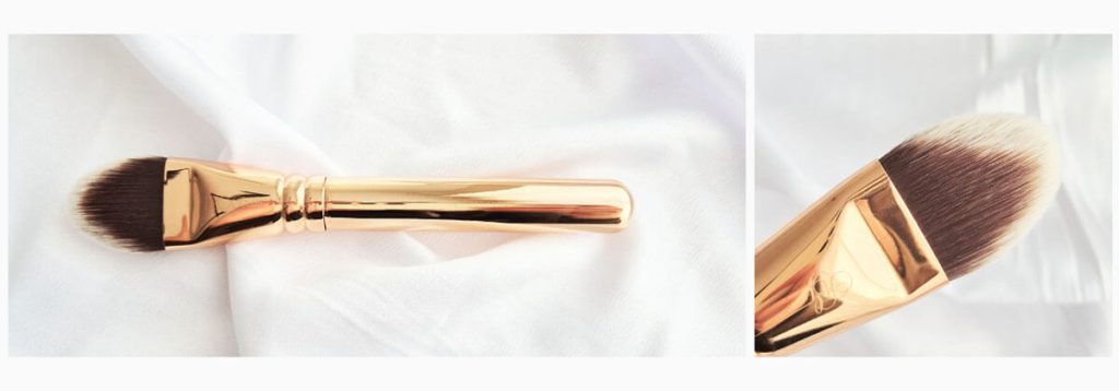 Pinceau fond de teint Zoeva 112 Face Curve rose gold avec tête large et arrondie.